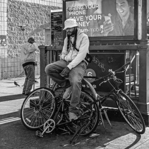 New York Street Photography Workshop - Man on bicycle in Harlem
